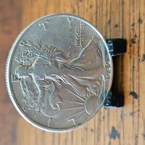 1939 liberty walking 1/ dollar in ex fine circulated  cond. US mint.. not a fake